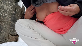 nippleringlover mother peeing outdoors in snowed forest and flashing small boobs with giant nipple piercings