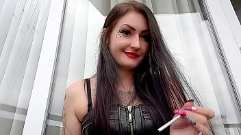 Mistress smokes 2 thin cigarettes. The fetish of cigarette smoke. And you will be her personal ashtray.
